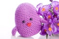 Chick with purple flowers Royalty Free Stock Photo