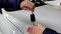 Handover of vehicle keys - purchase or sell car Royalty Free Stock Photo