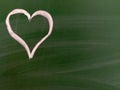 A single heart on a chalkboard. Royalty Free Stock Photo