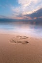 Handprint against the cloudy dawn