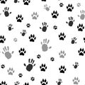 Handprint human and animal paw print seamless. Vector illustration. Isolated on white background Royalty Free Stock Photo