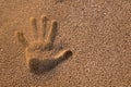 Handprint in the sand