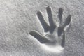 A handprint in the snow