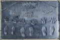 handprints in Hollywood Boulevard in the concrete of Chinese Theatre's forecourt