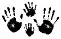 Handprints of a man, a woman, a child. Vector silhouette on white background. Royalty Free Stock Photo