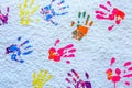 Handprints paint on a white wall Royalty Free Stock Photo