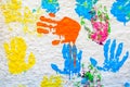 Handprints paint on a white wall Royalty Free Stock Photo