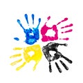 Handprints yellow, blue, pink and black Royalty Free Stock Photo