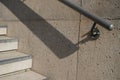 Handrail and stair steps of concrete with deep shadow Royalty Free Stock Photo