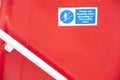 Handrail stairs steps hand rail safety sign red background on ship ferry airplane