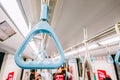 Handrails in a metro subway car , Handle or hand straps in MRT for the safety of passenger,Focus on a handrail