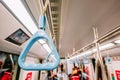 Handrails in a metro subway car , Handle or hand straps in MRT for the safety of passenger,Focus on a handrail