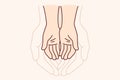 Hands of adult and child symbolize unity of different generations and care for children