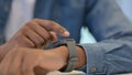 Hands of African Man Using Smartwatch, Close Up Royalty Free Stock Photo