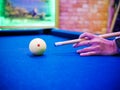 Hands aiming white ball to shot close up Royalty Free Stock Photo