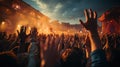 Hands in The Air of A Crowd at A Music Festival At Sunset Blurry Background Royalty Free Stock Photo