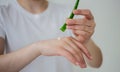 Hands applying aloe vera gel on a skin burn. Royalty Free Stock Photo