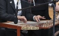 Hands and Arabian Qanon Musical Instrument