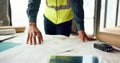 Hands of architect check blueprint at construction site for building, house or real estate industrial development Royalty Free Stock Photo