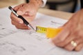 Hands, architecture and tape measure for drawing blueprint, illustration or engineering process of project. Closeup of Royalty Free Stock Photo