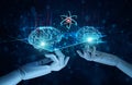 Hands of artificial intelligence AI touching a brains, Symbolic, Machine learning, of futuristic technology. Big data, Science Royalty Free Stock Photo