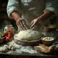 Hands of a Baker Kneading Fresh Dough with Flour and Ingredients on a Rustic Table Surrounded by Fresh Produce and Baking Tools in Royalty Free Stock Photo