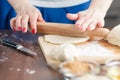 Hands baking dough with rolling pin Royalty Free Stock Photo