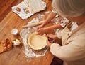 Hands, baking and senior with recipes in kitchen for dessert and cookies with flour for cake. Grandma, retirement and Royalty Free Stock Photo