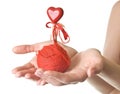 Hands with ball of threads and heart Royalty Free Stock Photo