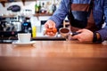 Hands bartender baristas make coffee cocoa cappuccino