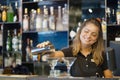 The hands of a bartender woman hold a professional shaker Royalty Free Stock Photo