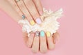 Hands with beautiful manicured nails and sea shell Royalty Free Stock Photo