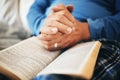 Hands, Bible and prayer with God and worship, religion with faith or spiritual, reading scripture for guide and hope Royalty Free Stock Photo