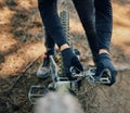 Hands, bicycle and repair pedal in woods for speed, dirt and nature in summer for extreme sport athlete. Man, Mountain Royalty Free Stock Photo