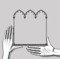 Hands with a black classic gothic architectural decorative frame Royalty Free Stock Photo