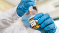 Researcher in protective clothing in laboratory. COVID-19 vaccine research Royalty Free Stock Photo