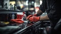 hands blurred interior car detailing