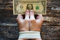 Hands bound men and money in the hands a symbol of slavery Royalty Free Stock Photo