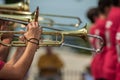 Hands on the brass while marching.