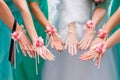 Hands of the bride and bridesmaids