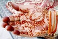 Hands of bride while performing wedding rituals