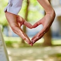 Hands bride and groom in shape of heart Royalty Free Stock Photo