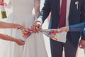 Hands of bride and groom tied Wedding towels Royalty Free Stock Photo