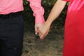 Young couple holding hands