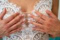 the hands of the bride with the wedding dress Royalty Free Stock Photo