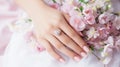 Hands of the bride with wedding nail design