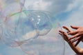 bubble Hands and Bubbles against the sky Royalty Free Stock Photo