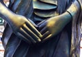Hands of Buddha statue. Royalty Free Stock Photo