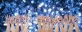 Hands Building Word Merry Christmas, Glittering And Sparkling Bokeh Background