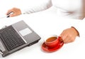 Hands of business woman with mouse and coffee Royalty Free Stock Photo